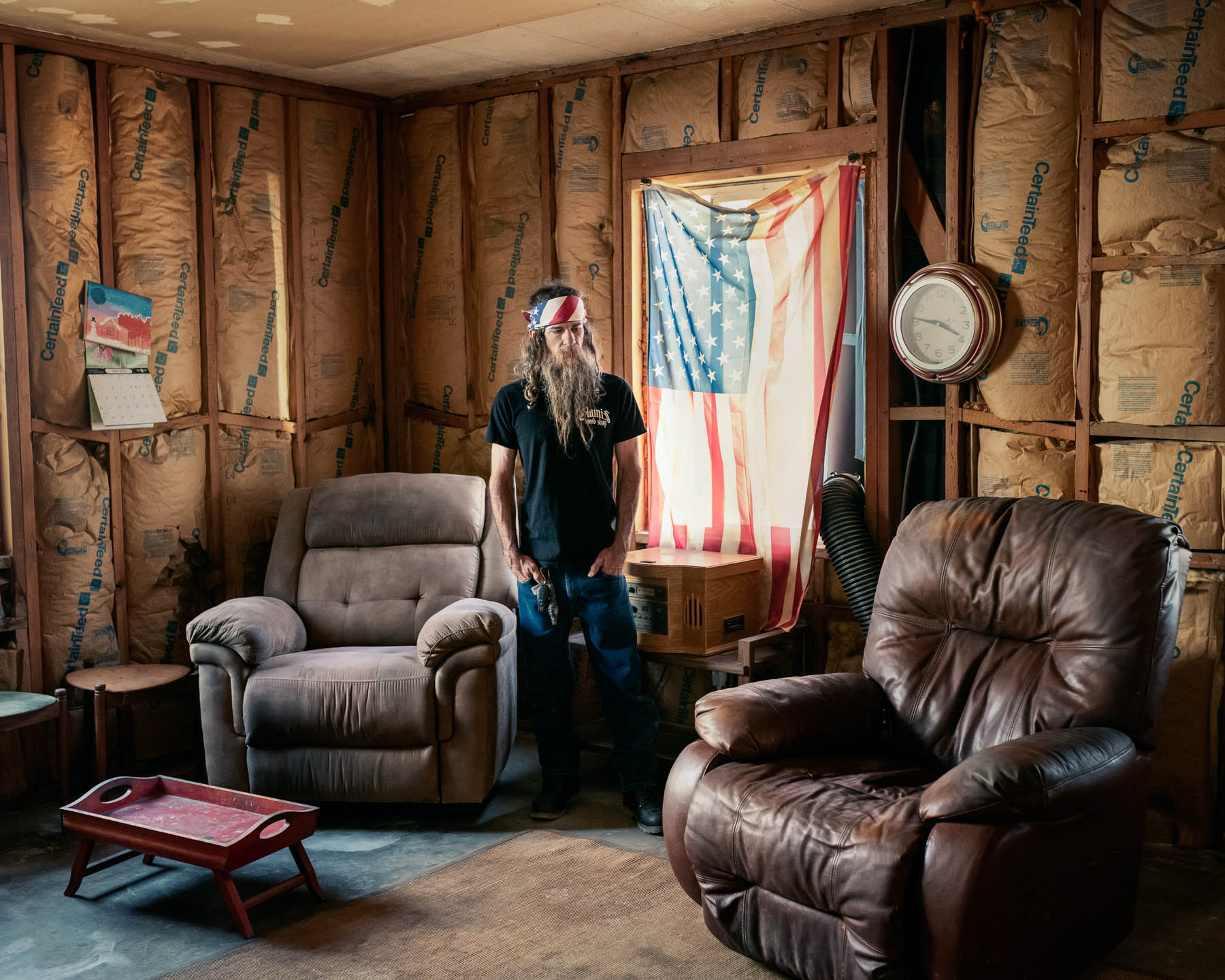 Jody Marquess, 43, looks at the recliner where his stepfather John Ramer died on June 17. It was Marquess’s birthday, but he was concerned about the 69-year-old, who eschewed air-conditioning. “He had tough-guy syndrome,” Marquess says, recalling a “stubborn” and “very frugal” but also “honest and simple” man. When Marquess stopped by that day—the high reached 118°F—he installed a portable AC unit for Ramer, who was sleeping. Two hours later, when he returned to drop off ice cream, Ramer was dead. From April through July, Maricopa County [confirmed](https://www.maricopa.gov/ArchiveCenter/ViewFile/Item/5286) 47 heat-associated deaths, more than triple the figure confirmed by the end of the same period last year. Marquess had long wondered if this was how Ramer might die in Arizona: “I just didn’t think it was going to be this soon.”