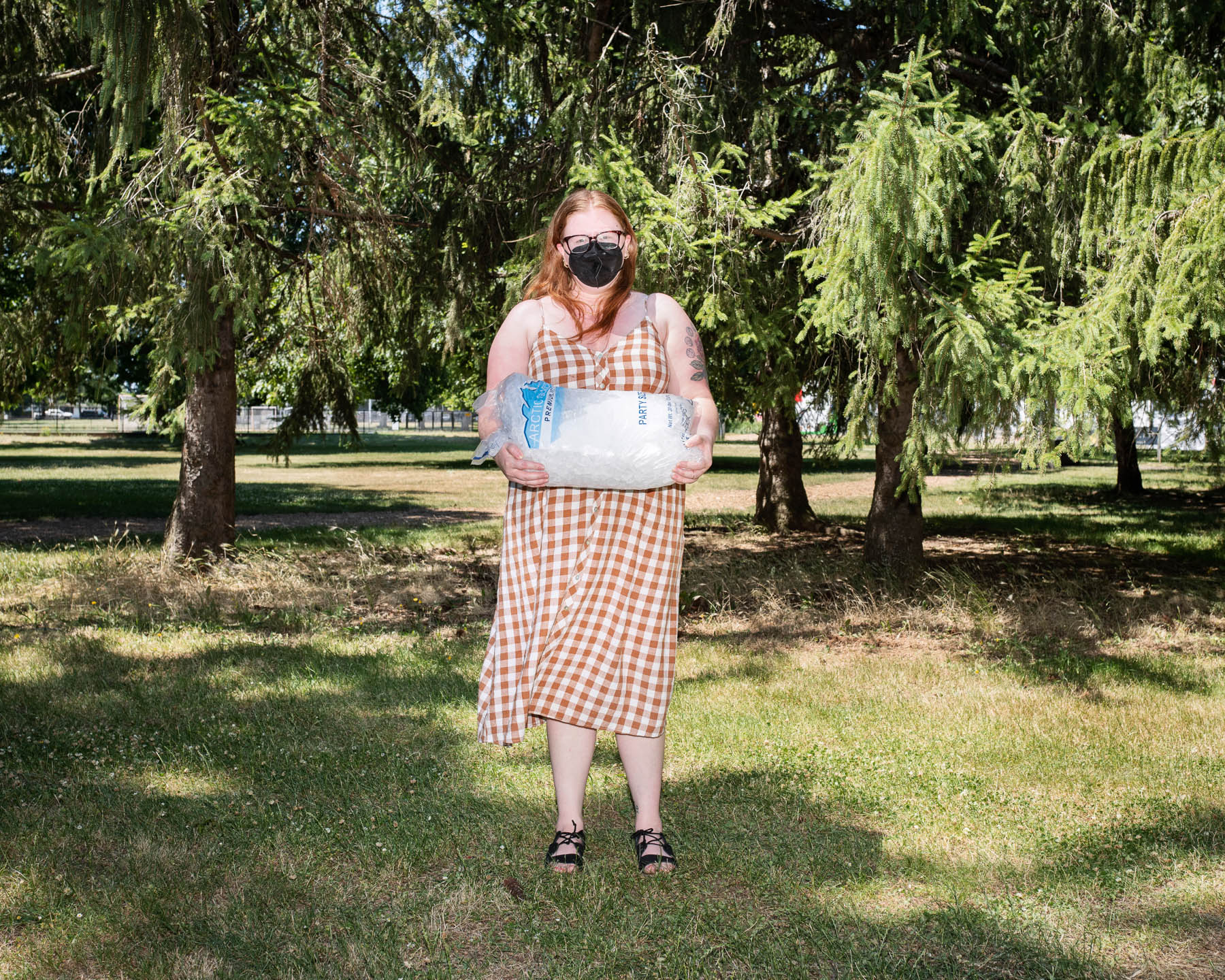 Rachel DeHart donates a bag of ice to a cooling station on June 27. One day after Portland hit 108°F, setting a new all-time high, the record [fell again](https://twitter.com/NWSPortland/status/1409303279872274434) when the temperature reached 112°F.