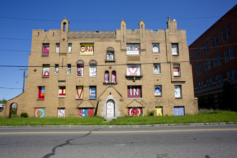 Local artists collaborated to turn an abandoned apartment building into a massive community art project. The windows read, “Live in Osborn.”