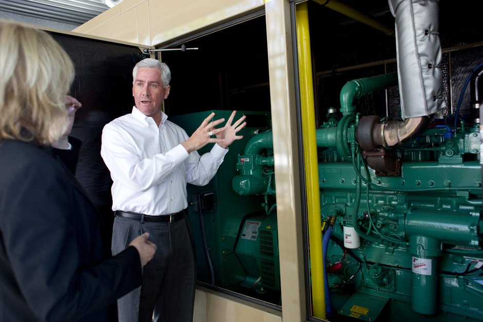 David Stenson of Inventev, a Detroit energy startup, discussing generator technology with Amanda Roraff, of NextEnergy.